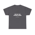 A dark t-shirt printed across the chest in large heavy white capitals on two lines: WE'RE THE POWER USERS. Beneath it, two short white rules run either side of a small ring with an electric-blue inner circle and a white centre, and NO SIGHT REQUIRED sits below in small widely spaced capitals.