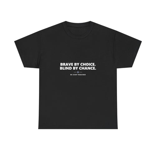 A dark t-shirt printed across the chest in large heavy white capitals on two lines: BRAVE BY CHOICE. BLIND BY CHANCE. Beneath it, two short white rules run either side of a small ring with an electric-blue inner circle and a white centre, and NO SIGHT REQUIRED sits below in small widely spaced capitals.